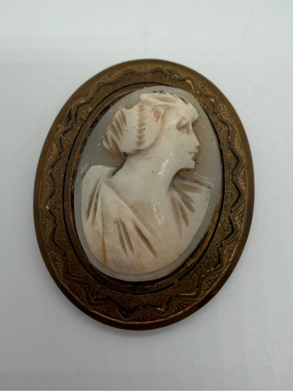 Coro brass tone cameo brooch